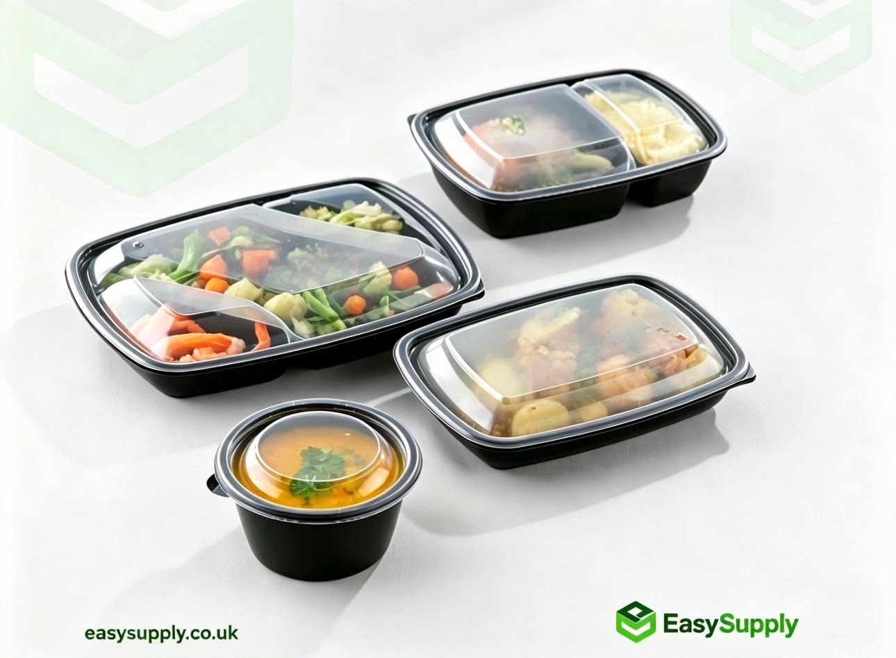 Black meal prep containers with food